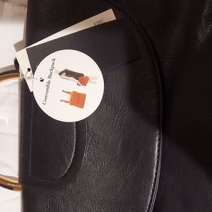 NWT Backpack reversible bag